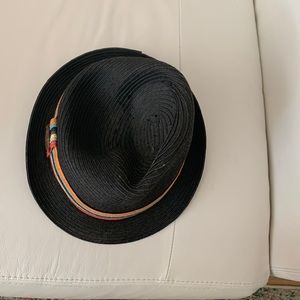 Brown Hat with orange trim perfect for day at horse races.